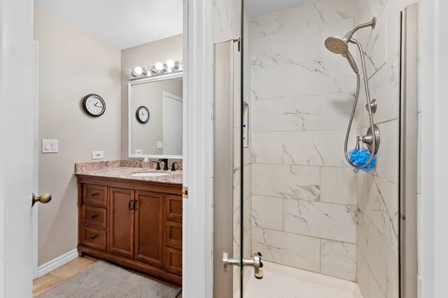 a view of an house with backyard space and tree