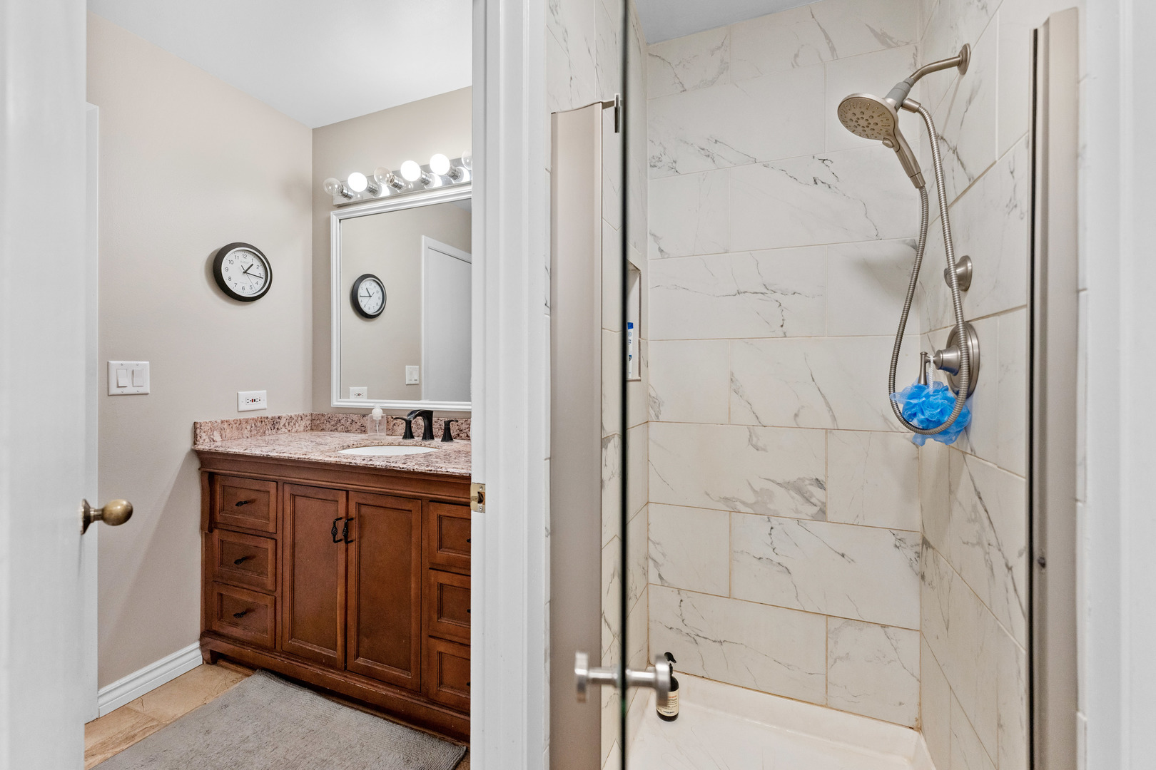 336 Roberts Road Inverness, IL 60010 - Photo 49 of 80 a bathroom with a sink and a mirror
