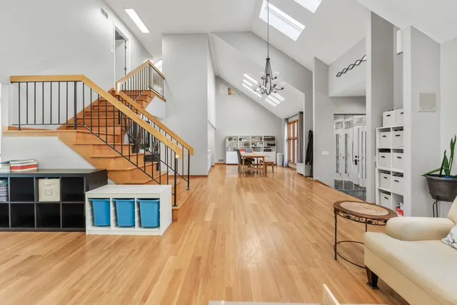 a view of a dining room with furniture and a table