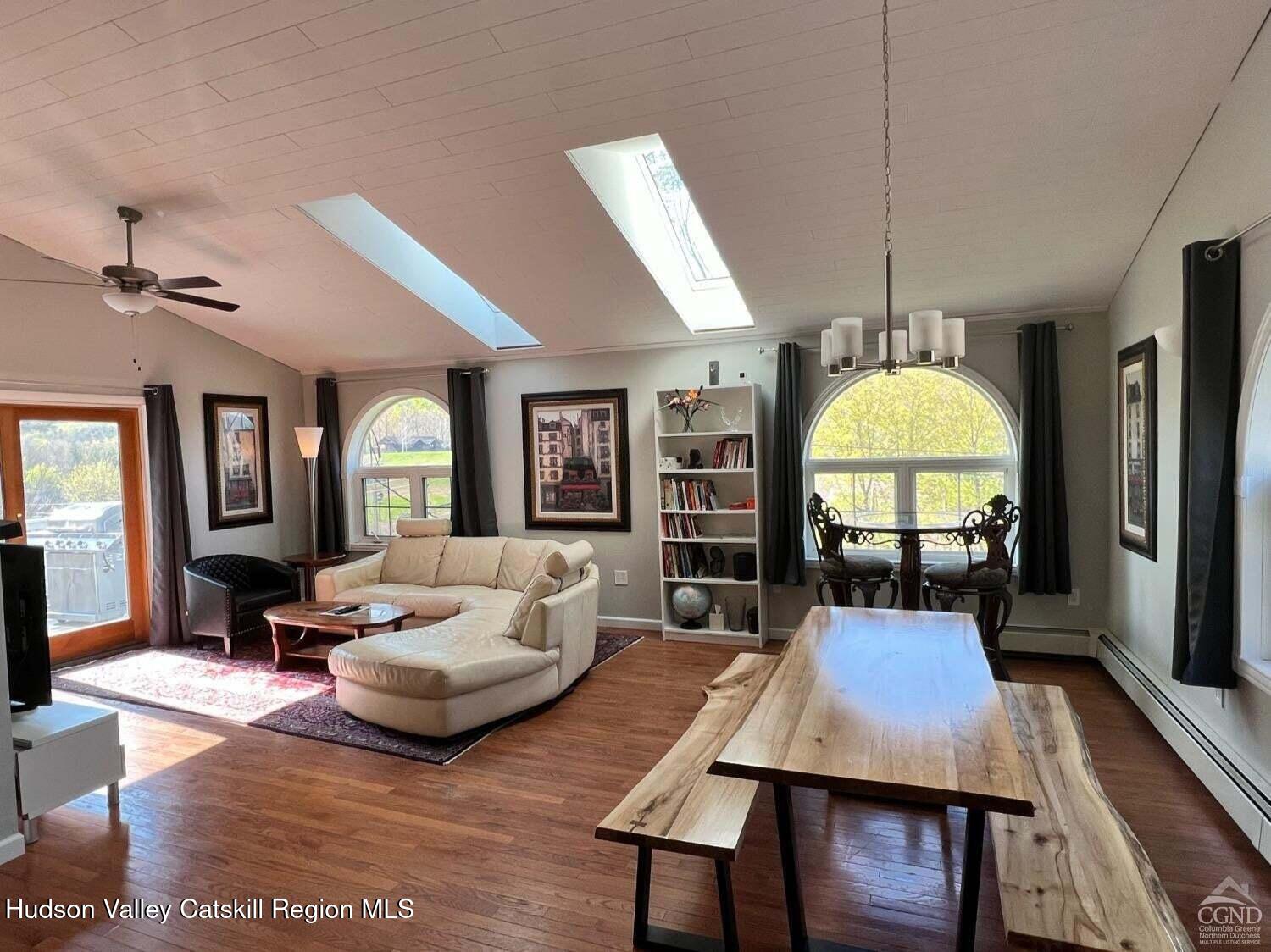 16 Hickory Hill Road Windham, NY 12496 - Photo 5 of 39 a living room with furniture fireplace and a large window