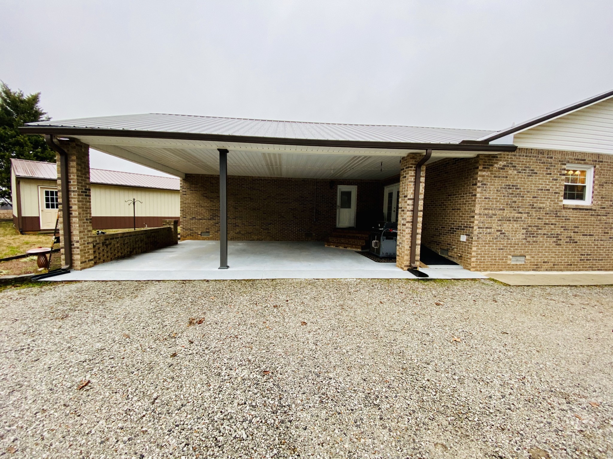 384 Raymond Cowan Road Decherd, TN 37324 - Photo 22 of 32 a view of a car garage