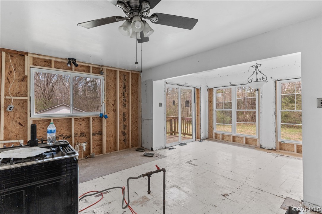 5660 Cartersville Road Powhatan, VA 23139 - Photo 12 of 15 a view of a livingroom with furniture and chandelier