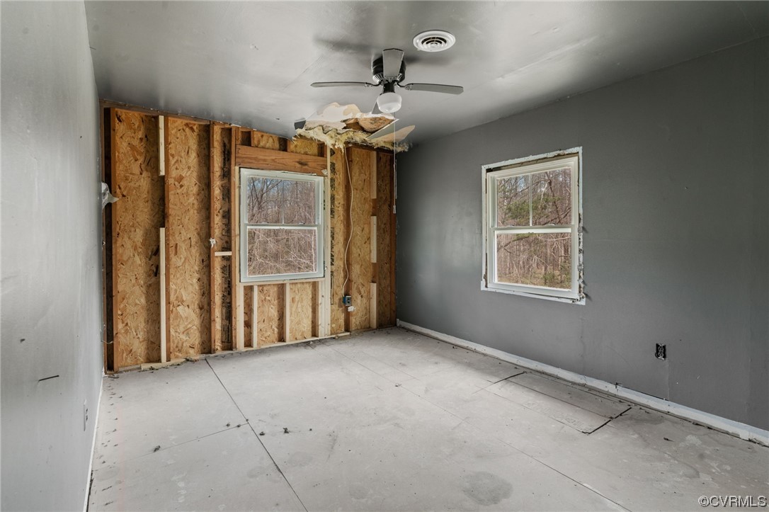 5660 Cartersville Road Powhatan, VA 23139 - Photo 13 of 15 an empty room with windows
