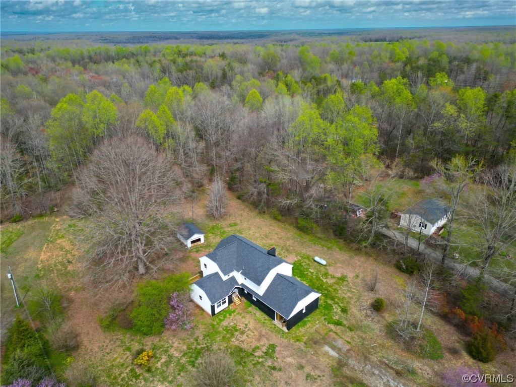 5660 Cartersville Road Powhatan, VA 23139 - Photo 2 of 15 a aerial view of a house with a yard