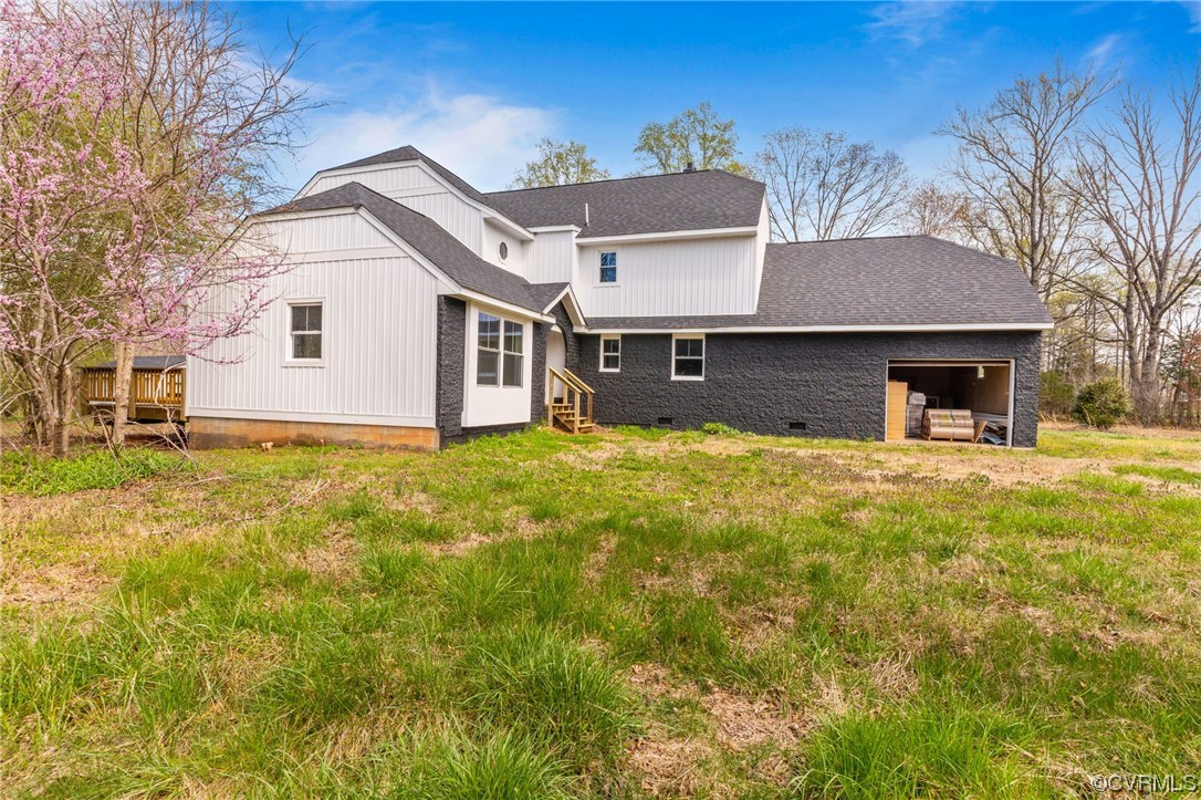 5660 Cartersville Road Powhatan, VA 23139 - Photo 6 of 15 a view of a house with a yard
