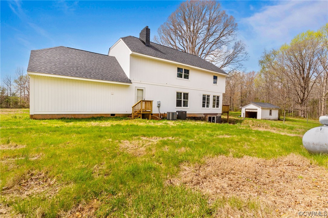 5660 Cartersville Road Powhatan, VA 23139 - Photo 8 of 15 a front view of house with yard and trees