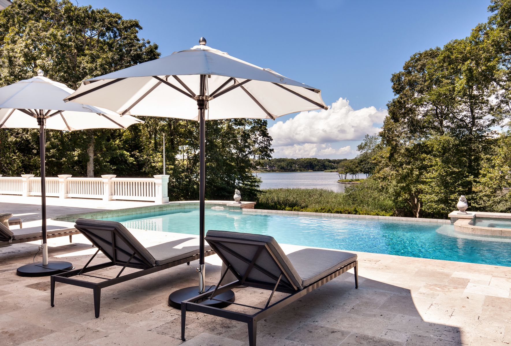 81 Briar Patch Road East Hampton, NY 11937 - Photo 11 of 25 a view of a terrace with furniture and a yard