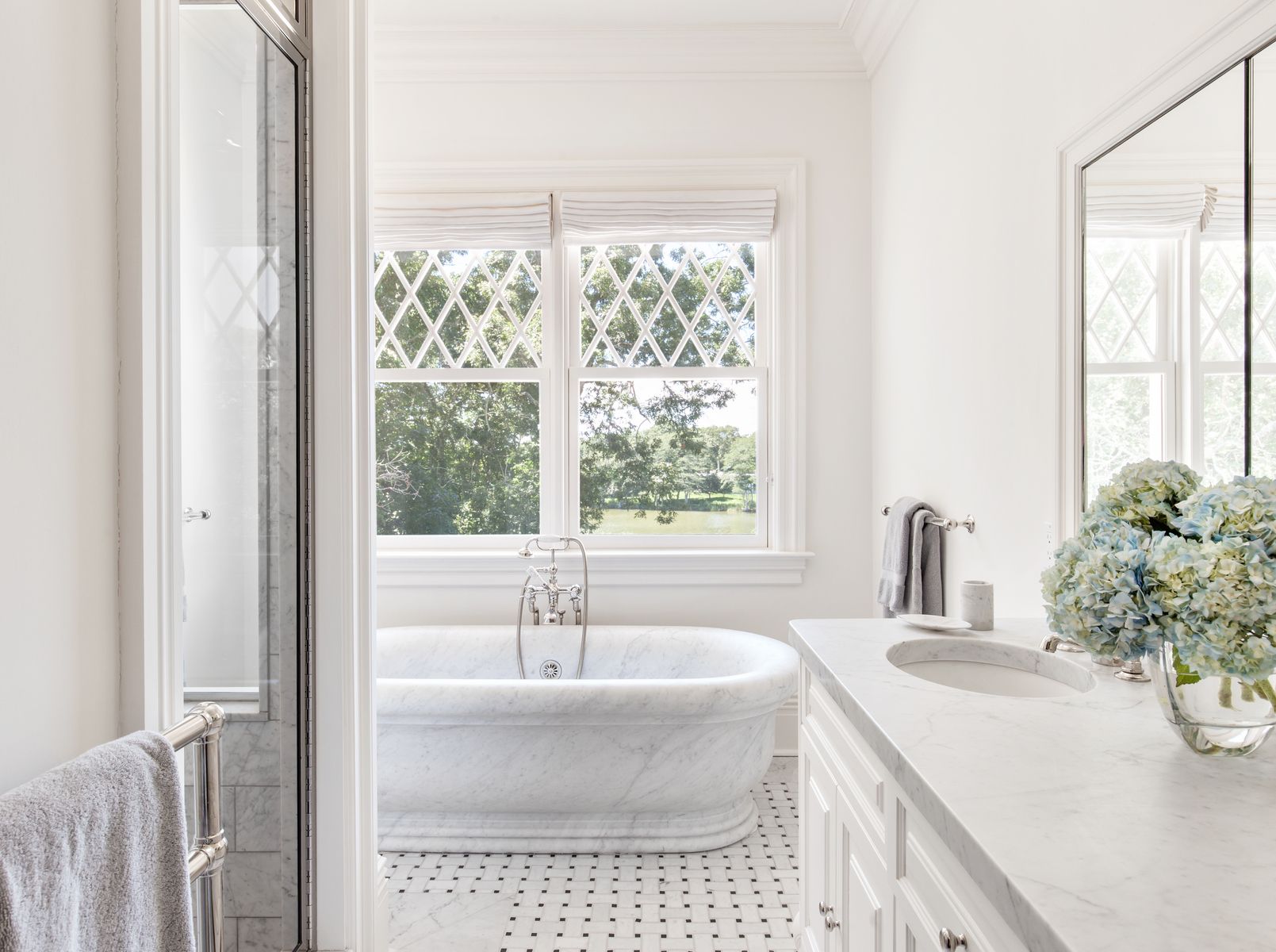81 Briar Patch Road East Hampton, NY 11937 - Photo 16 of 25 a bathroom with a granite countertop sink and a large mirror