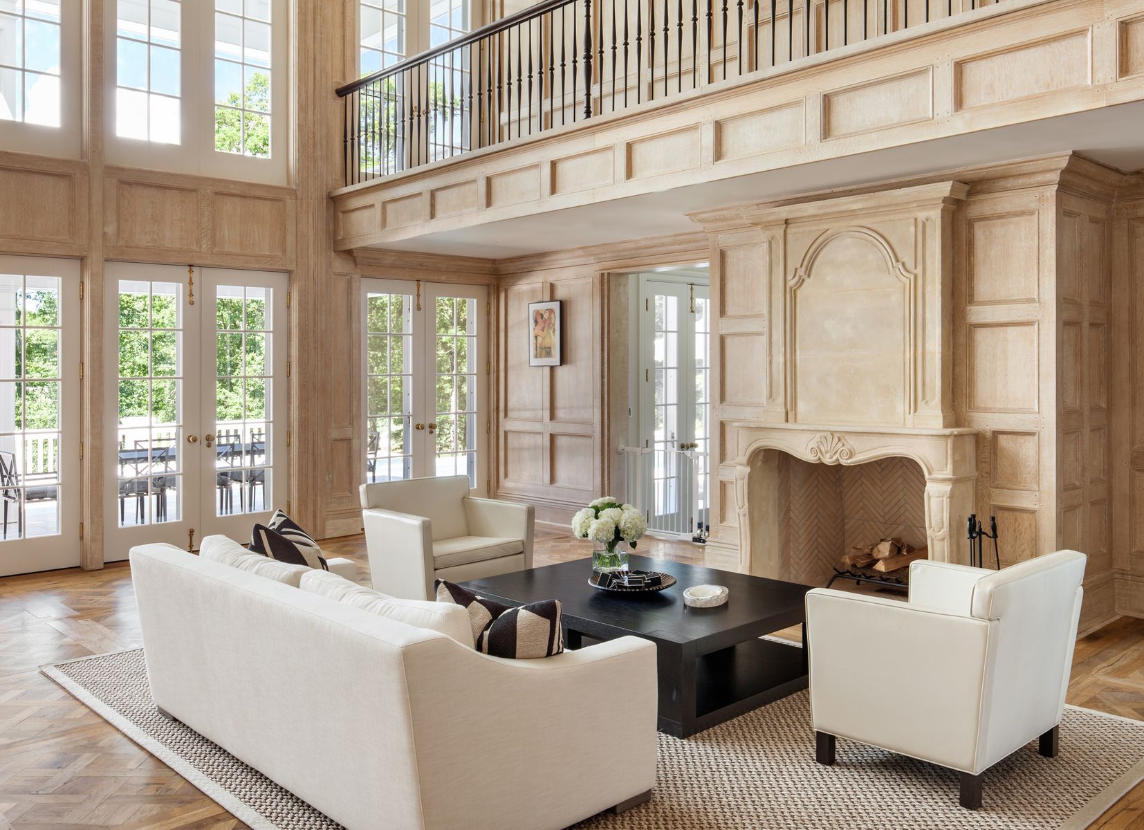 81 Briar Patch Road East Hampton, NY 11937 - Photo 6 of 25 a living room with furniture a large window and flat screen tv