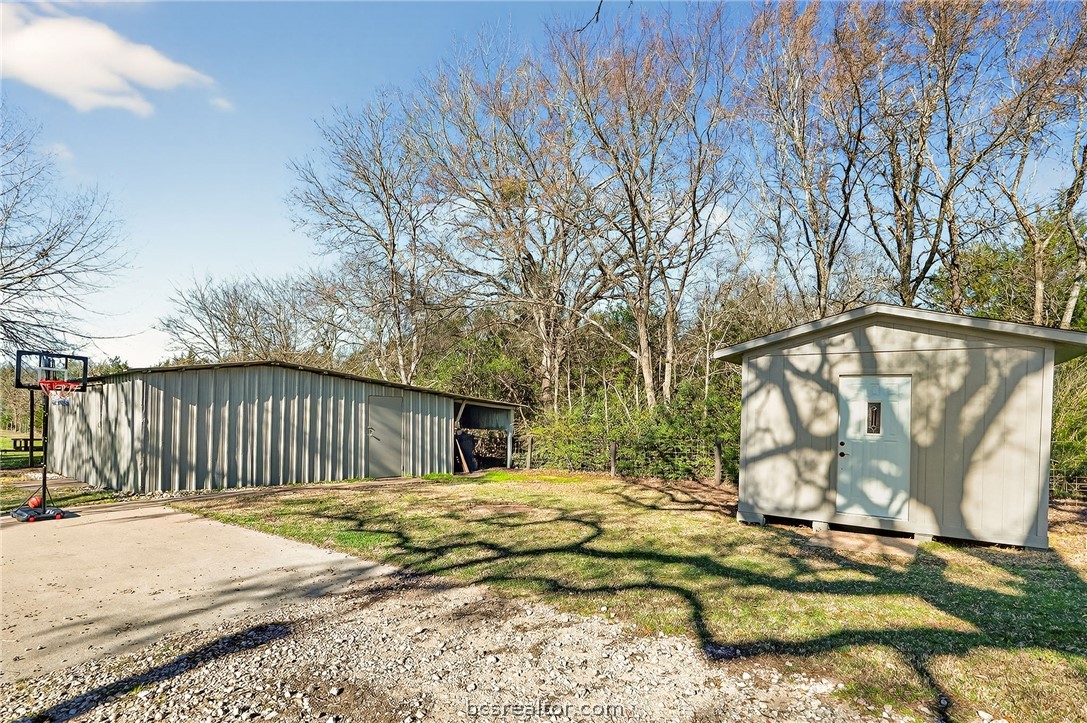 10054 Arnold Lane Bryan, TX 77845 - Photo 29 of 32 a view of backyard of a house