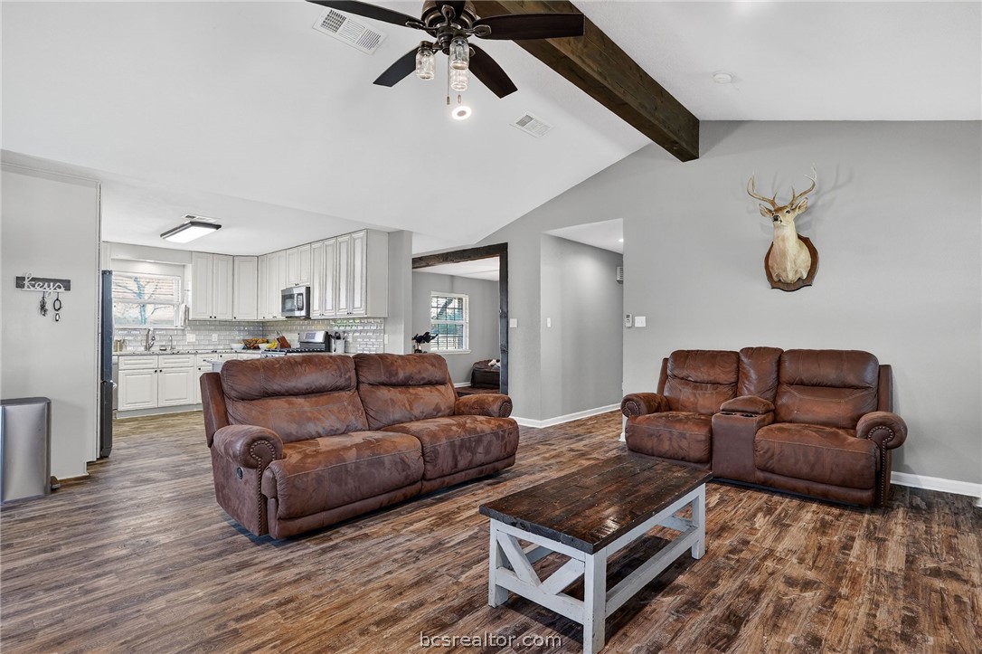 10054 Arnold Lane Bryan, TX 77845 - Photo 5 of 32 a living room with furniture and wooden floor