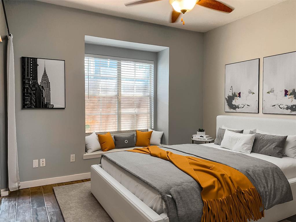 8601 Park Lane, Unit 414 Dallas, TX 75231 - Photo 4 of 23 a bedroom with a bed and window