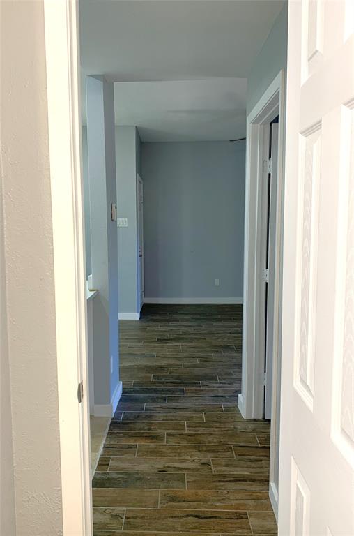 8601 Park Lane, Unit 414 Dallas, TX 75231 - Photo 10 of 23 a view of room with wooden floor