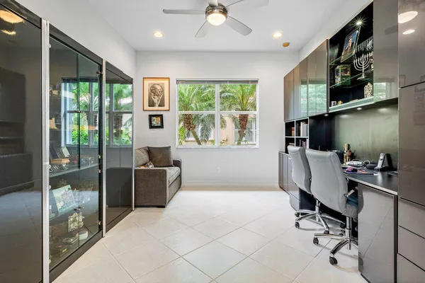 a bedroom with a workspace