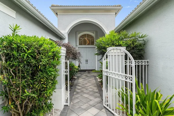 a view of entrance gate of a house
