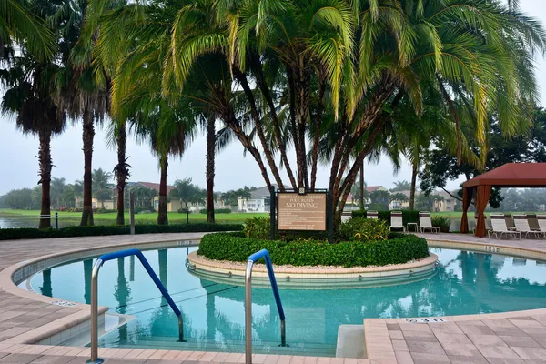 a view of an outdoor space and tennis court