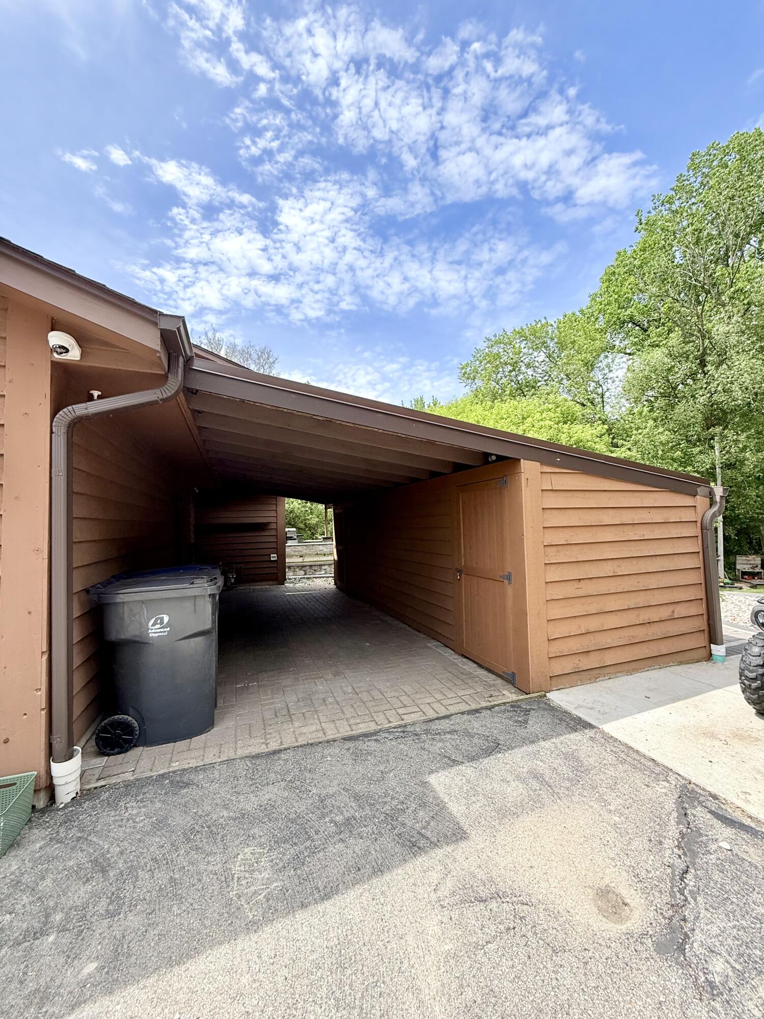 2556 North Green Bay Road Mount Pleasant, WI 53406 - Photo 5 of 49 OVER HANG/ STORAGE