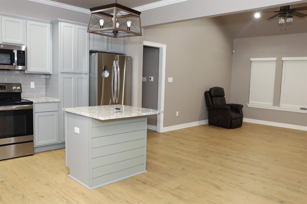 901 Lee Street Benton, LA 71006 - Photo 7 of 34 a bathroom with a sink vanity and a mirror