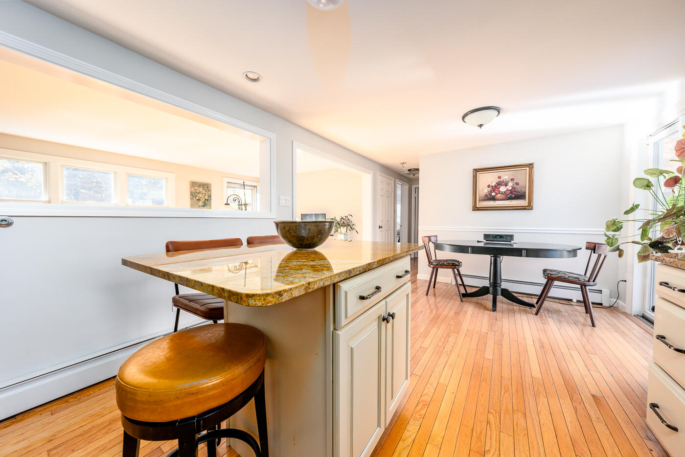 4 Oregon Road Mashpee, MA 02649 - Photo 15 of 31 a dining room with furniture and wooden floor