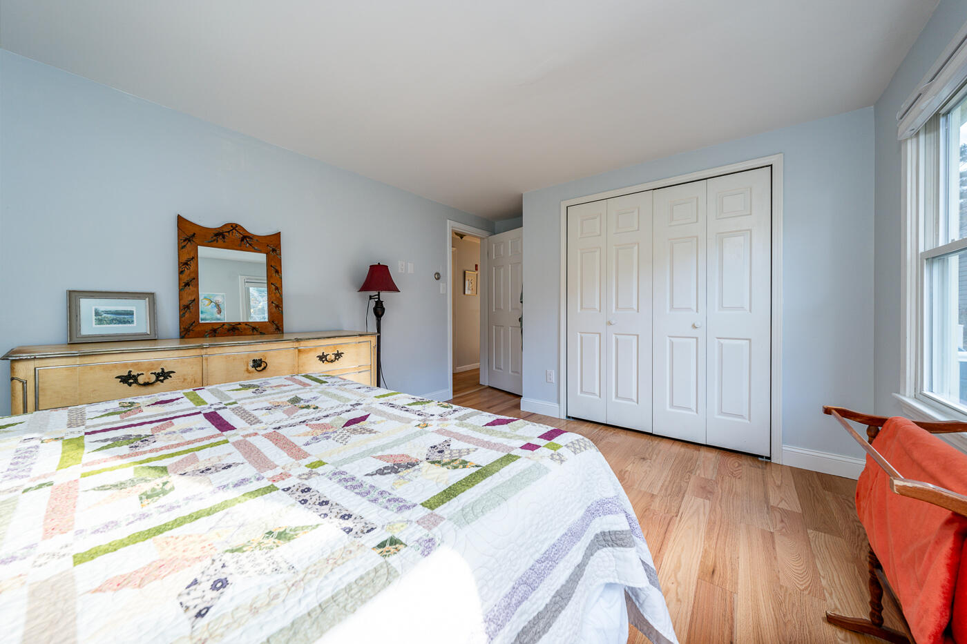 4 Oregon Road Mashpee, MA 02649 - Photo 20 of 31 a bedroom that has a bed and a table in it