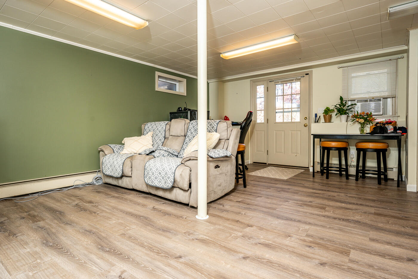 4 Oregon Road Mashpee, MA 02649 - Photo 23 of 31 a living room with furniture and a wooden floor