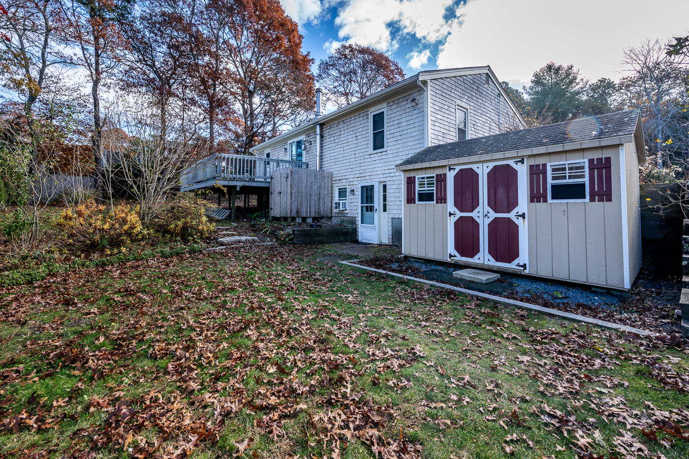4 Oregon Road Mashpee, MA 02649 - Photo 27 of 31 a view of a house with a yard