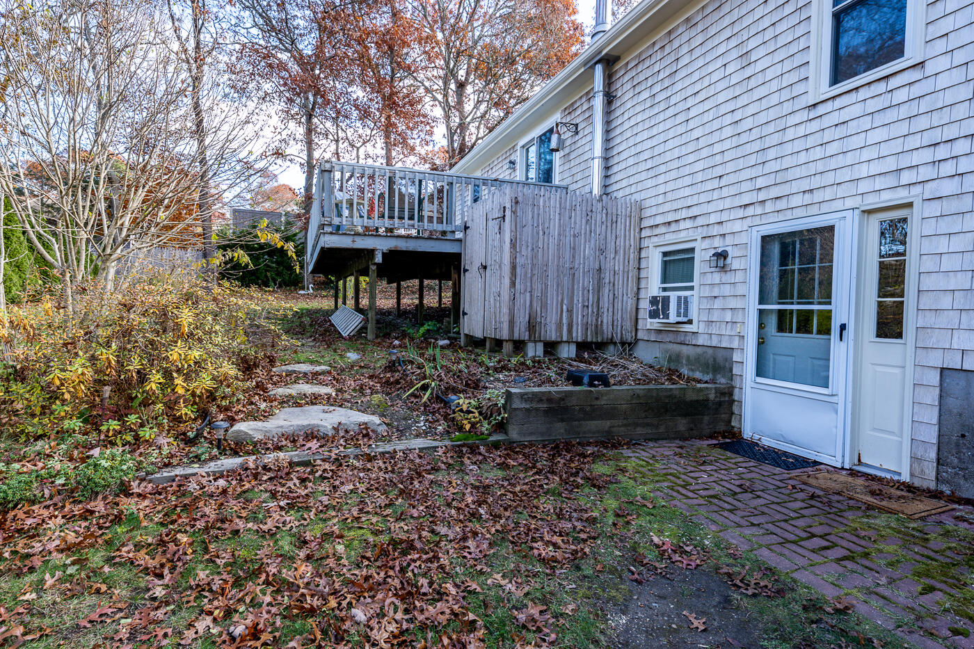 4 Oregon Road Mashpee, MA 02649 - Photo 29 of 31 a view of a house with backyard and sitting area