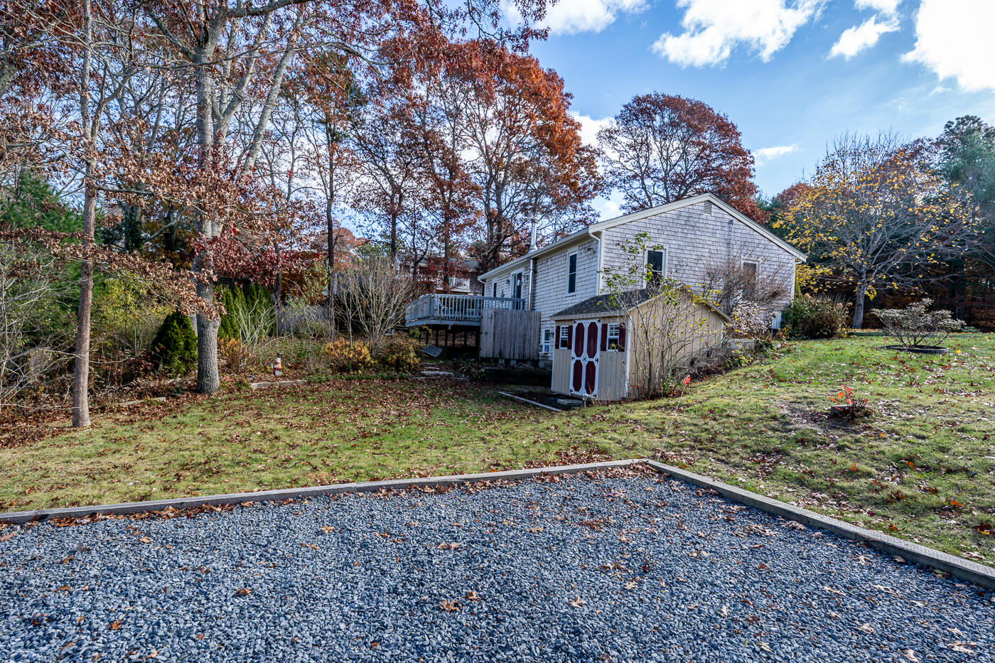 4 Oregon Road Mashpee, MA 02649 - Photo 31 of 31 a view of a house with a yard