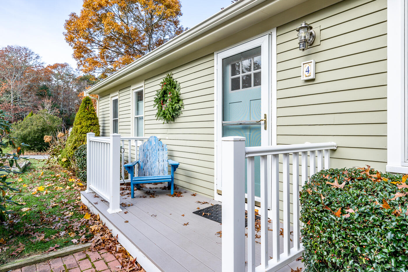 4 Oregon Road Mashpee, MA 02649 - Photo 7 of 31 a view of a balcony with chairs and a large tree
