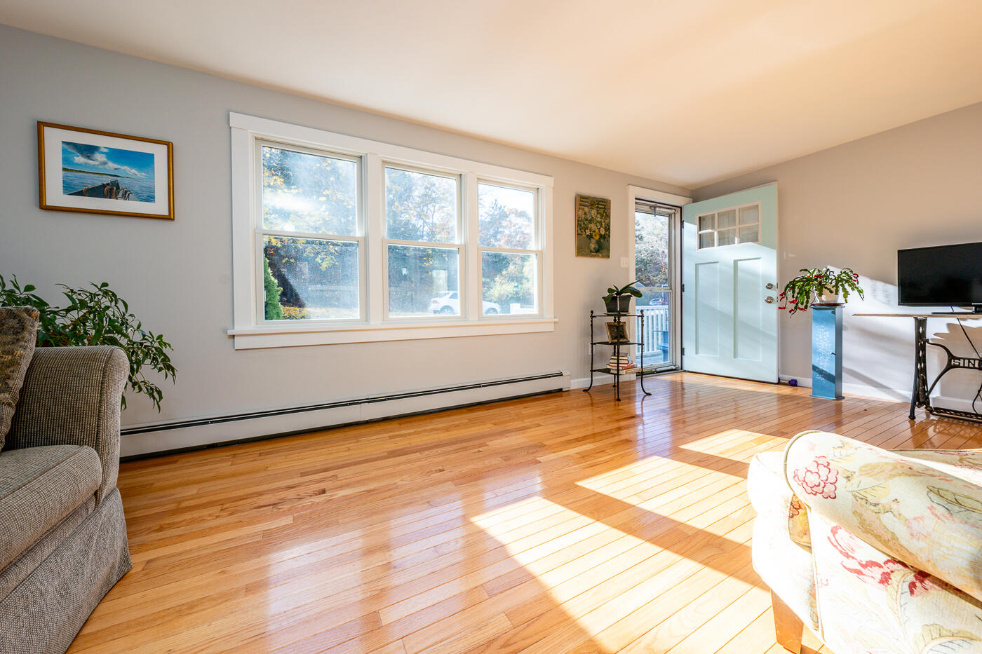 4 Oregon Road Mashpee, MA 02649 - Photo 9 of 31 a living room with furniture and a large window