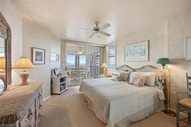 a bedroom with bed and a window