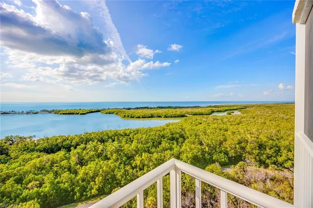 a view of a lake from a balcony