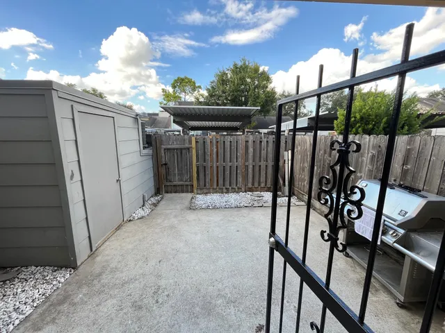 a view of balcony with furniture