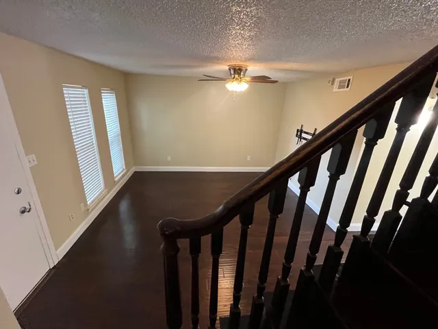 a view of entryway with stairs