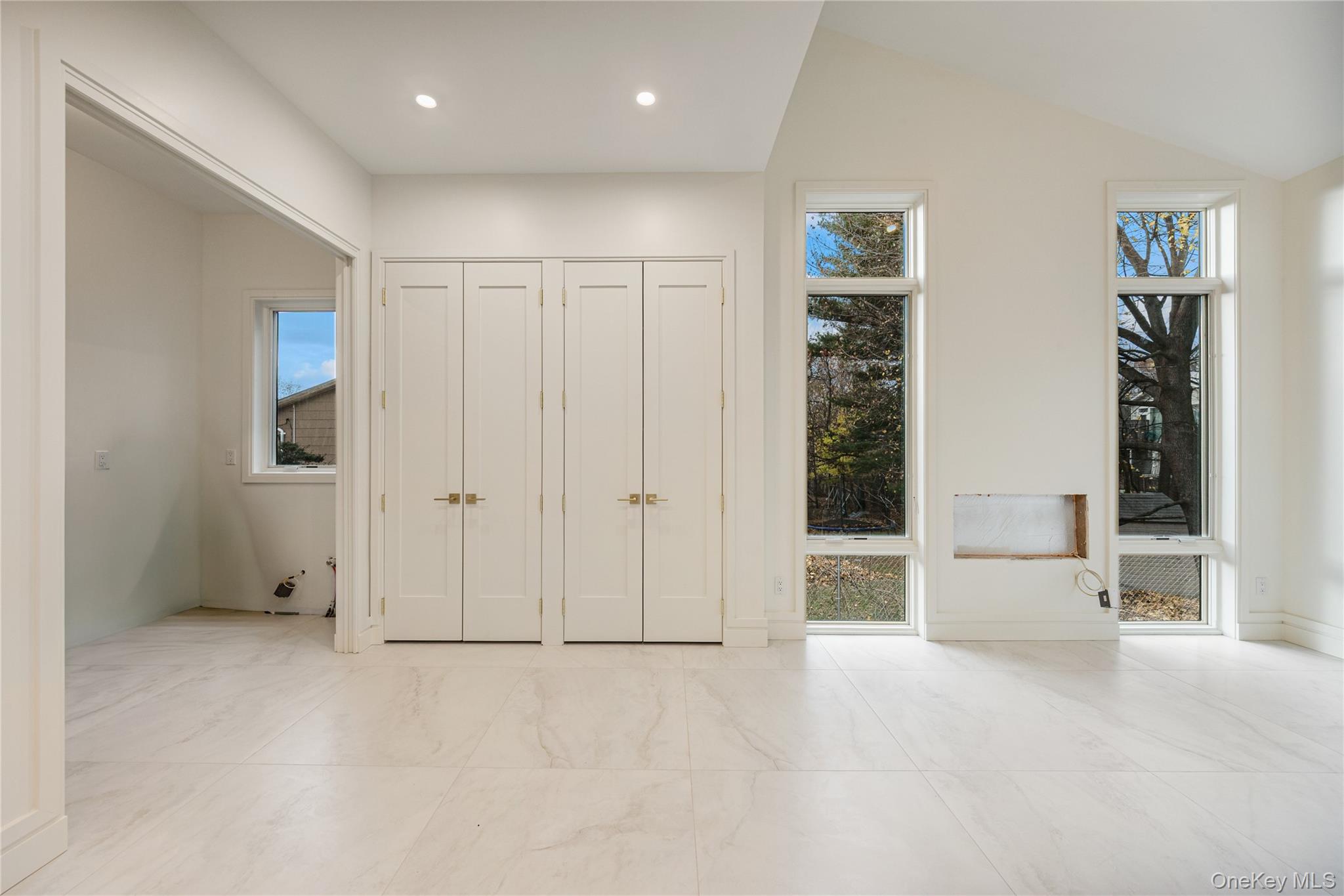 12 Buckman Place, Unit 101 Monsey, NY 10952 - Photo 15 of 50 Unfurnished bedroom featuring a closet and recessed lighting