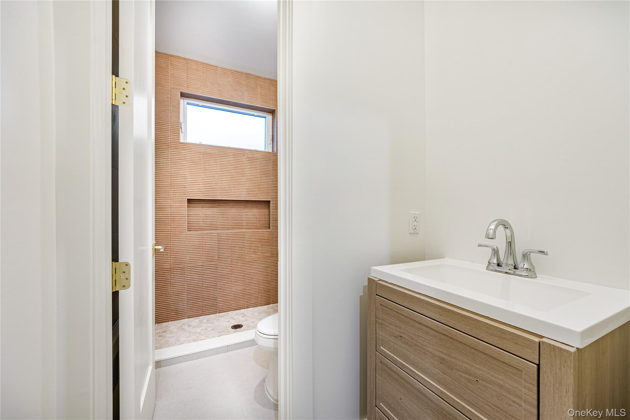 12 Buckman Place, Unit 101 Monsey, NY 10952 - Photo 32 of 50 Full bathroom with vanity and a shower stall