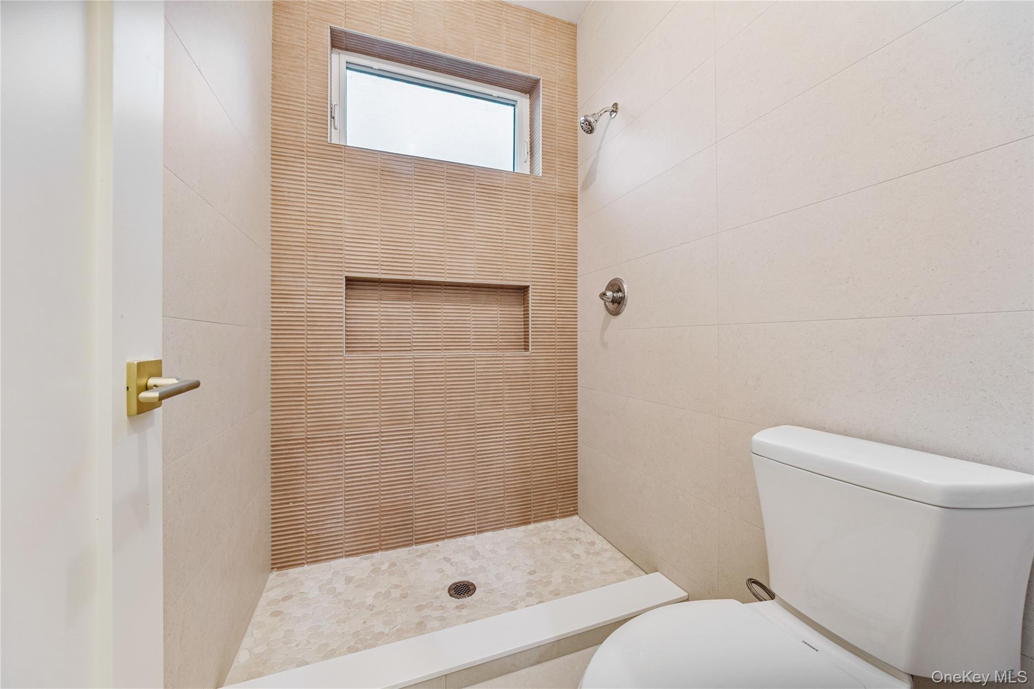 12 Buckman Place, Unit 101 Monsey, NY 10952 - Photo 33 of 50 Bathroom with a stall shower and toilet