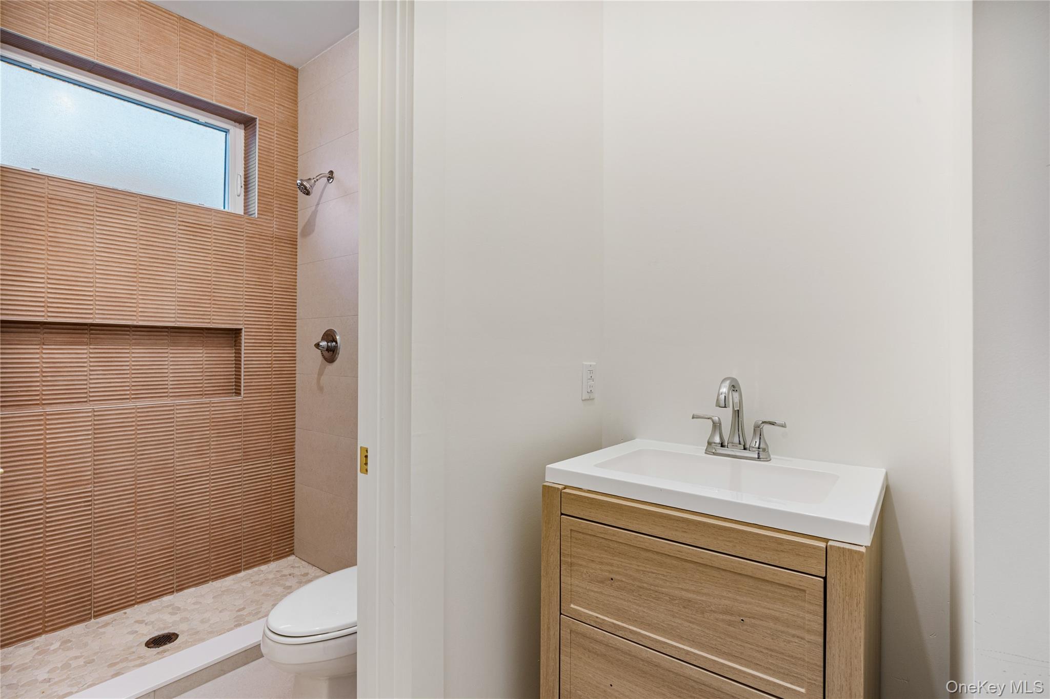 12 Buckman Place, Unit 101 Monsey, NY 10952 - Photo 35 of 50 Full bath with vanity and a stall shower