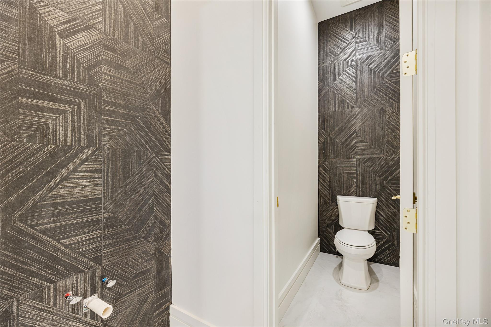 12 Buckman Place, Unit 101 Monsey, NY 10952 - Photo 8 of 50 Bathroom with baseboards and marble finish floors