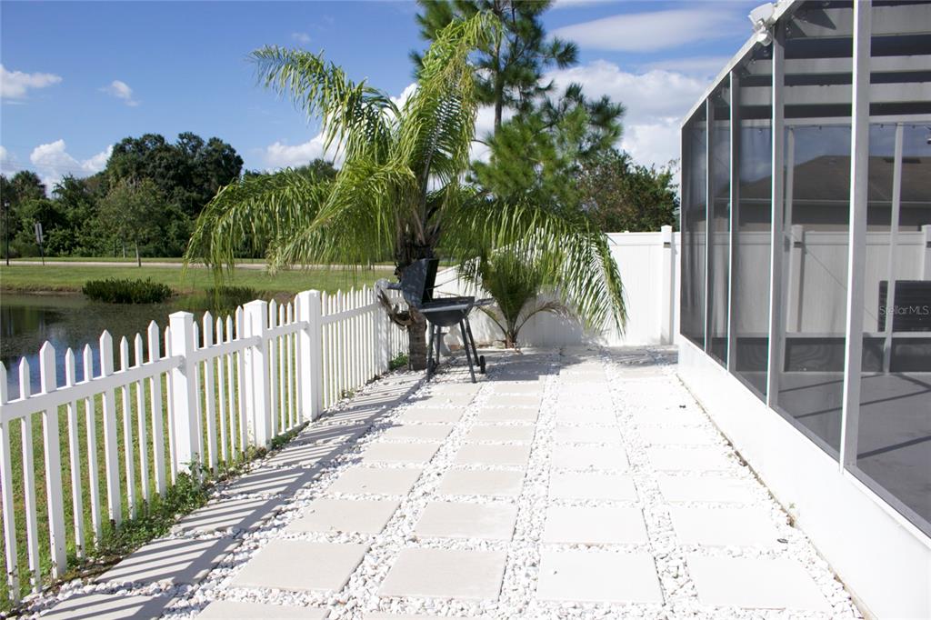 12107 Barnsley Reserve Place Gibsonton, FL 33534 - Photo 23 of 26 a view of a wooden floor and a lake view