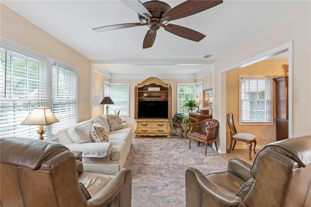 204 Anguilla Avenue St. Simons Island, GA 31522 - Photo 8 of 35 Living Room with Wood Floors