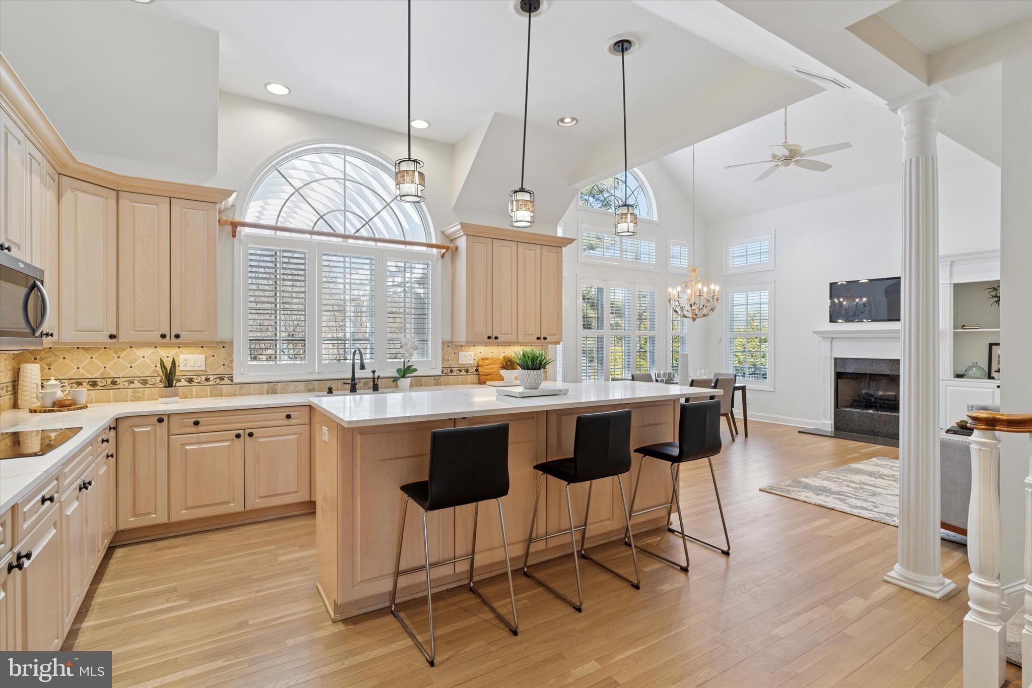 701 Brushtown Road Lower Gwynedd, PA 19002 - Photo 14 of 61 a large kitchen with a table and chairs