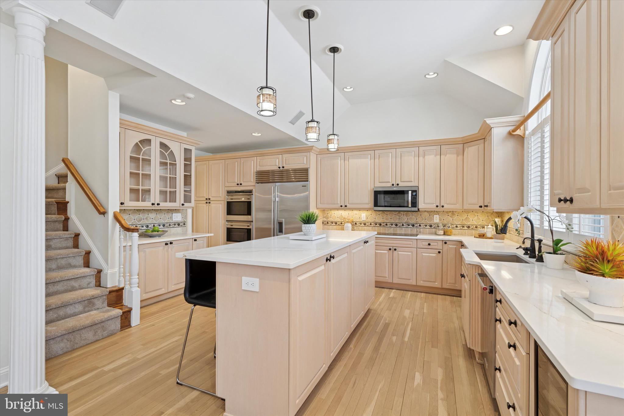 701 Brushtown Road Lower Gwynedd, PA 19002 - Photo 15 of 61 a kitchen with white cabinets appliances and sink