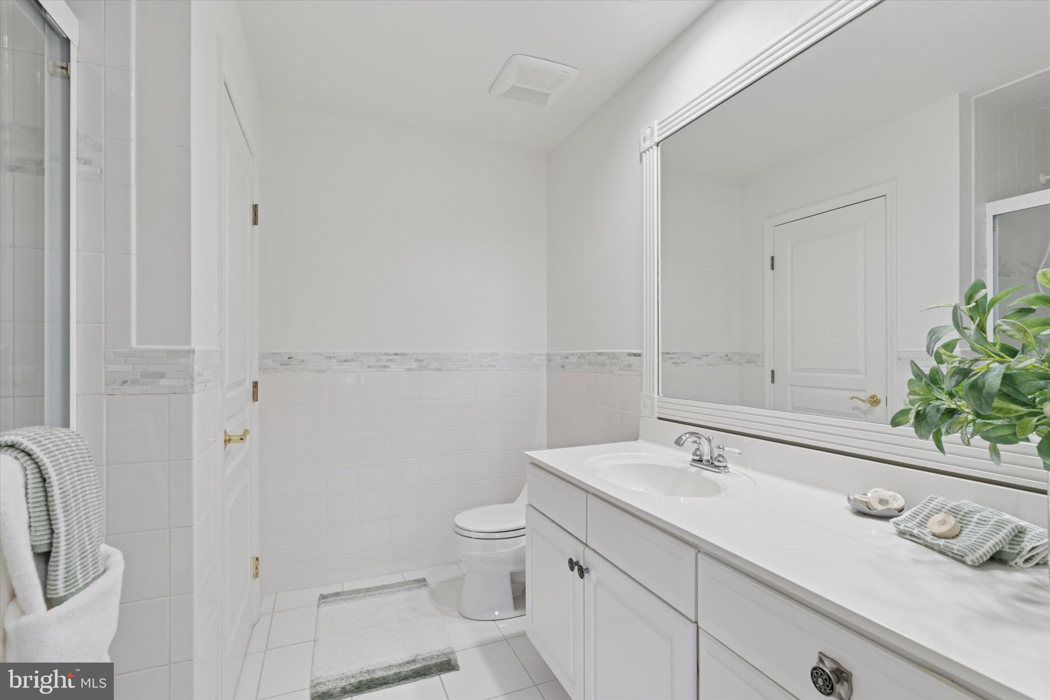 701 Brushtown Road Lower Gwynedd, PA 19002 - Photo 30 of 61 a bathroom with a sink a toilet and shower