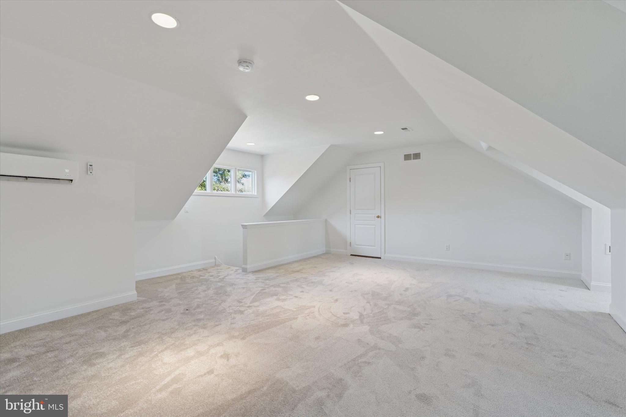 701 Brushtown Road Lower Gwynedd, PA 19002 - Photo 36 of 61 an empty room with white walls and refrigerator