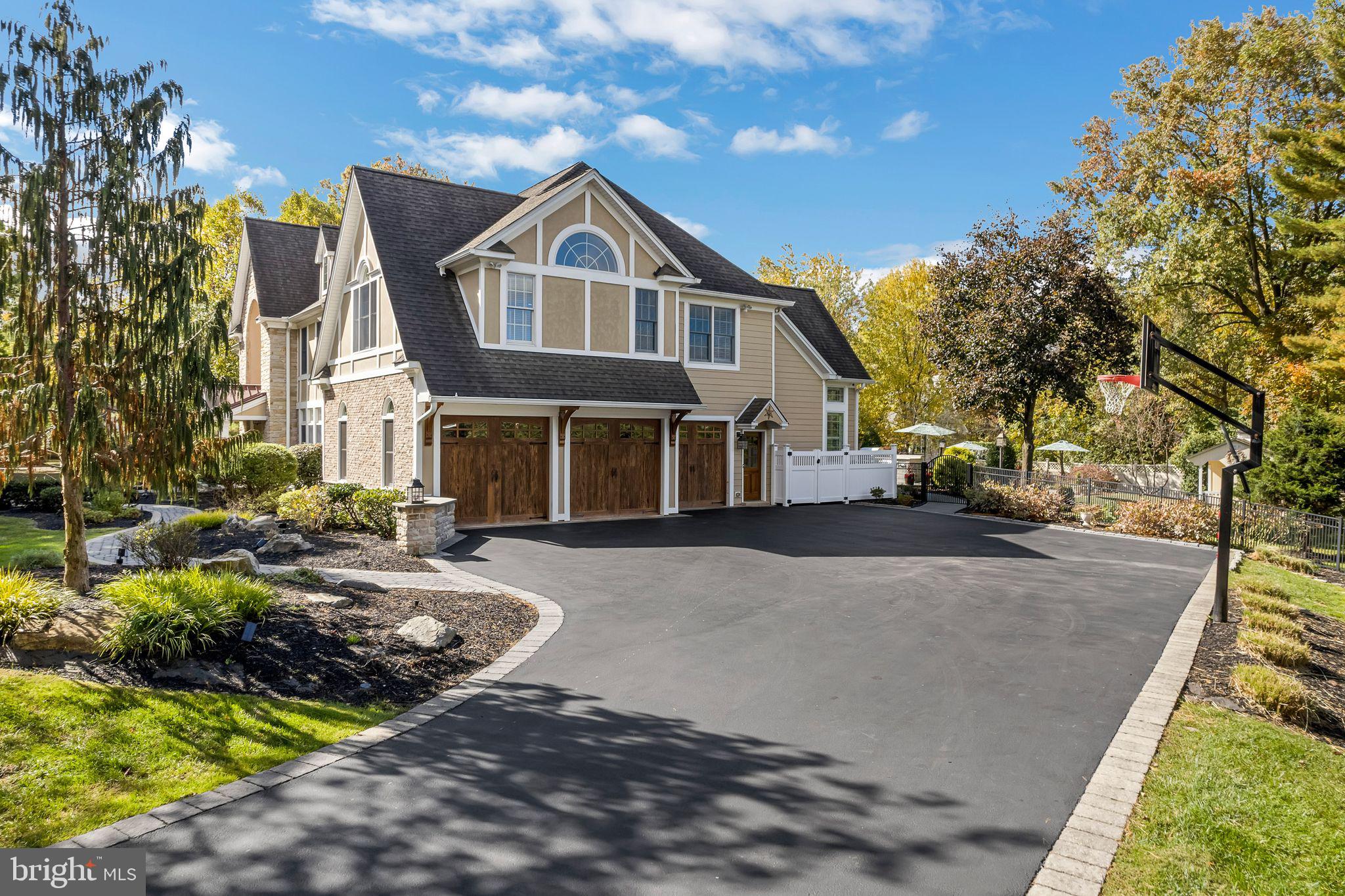 701 Brushtown Road Lower Gwynedd, PA 19002 - Photo 43 of 61 a front view of a house with garden