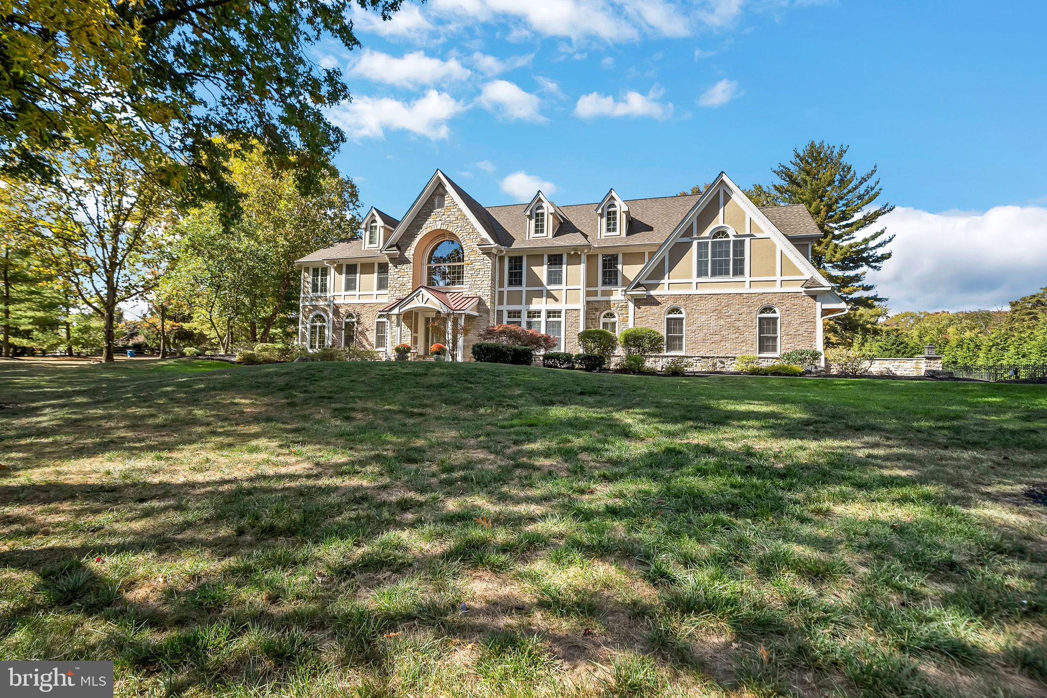 701 Brushtown Road Lower Gwynedd, PA 19002 - Photo 45 of 61 a front view of a house with a yard