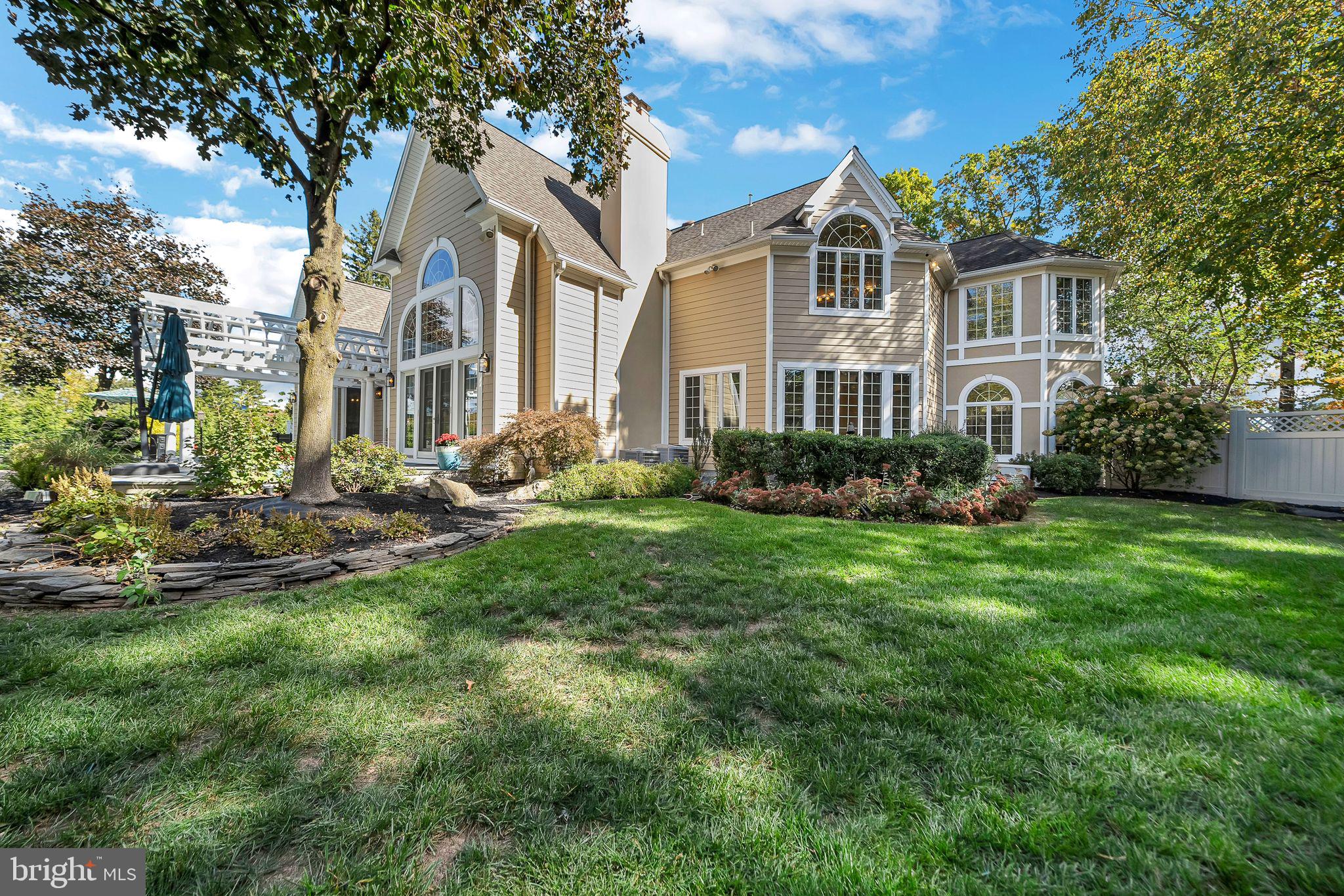 701 Brushtown Road Lower Gwynedd, PA 19002 - Photo 53 of 61 a front view of a house with a yard