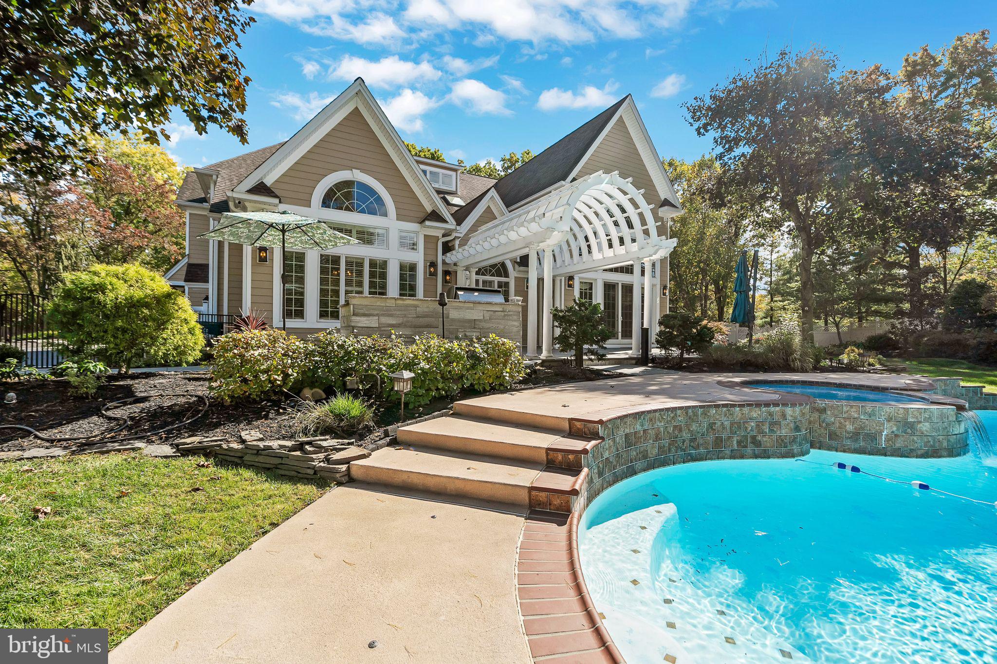 701 Brushtown Road Lower Gwynedd, PA 19002 - Photo 57 of 61 a front view of a house with a yard