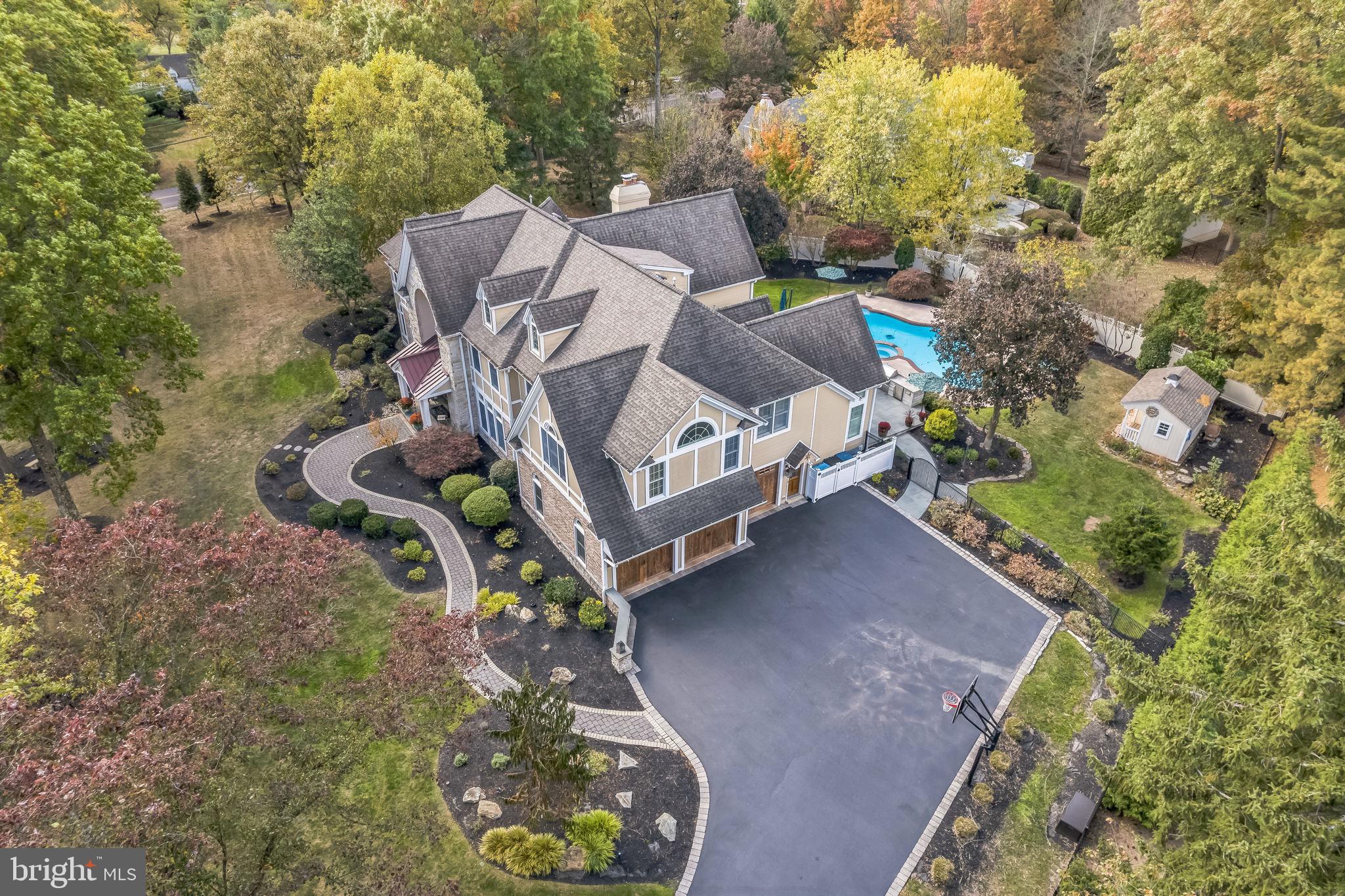 701 Brushtown Road Lower Gwynedd, PA 19002 - Photo 60 of 61 an aerial view of a house with a yard and garden